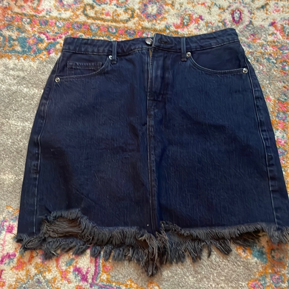 Good American Denim Distressed Unhemmed Mini Skirt